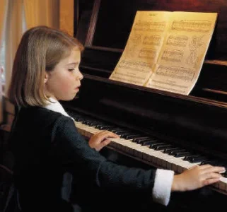 girl_playing_piano.webp