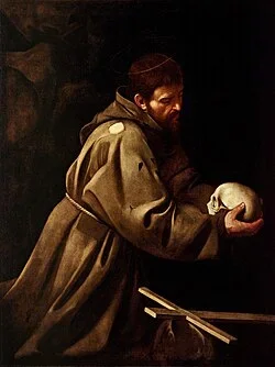 Saint_Francis_in_Prayer-Caravaggio_(c.1606).webp